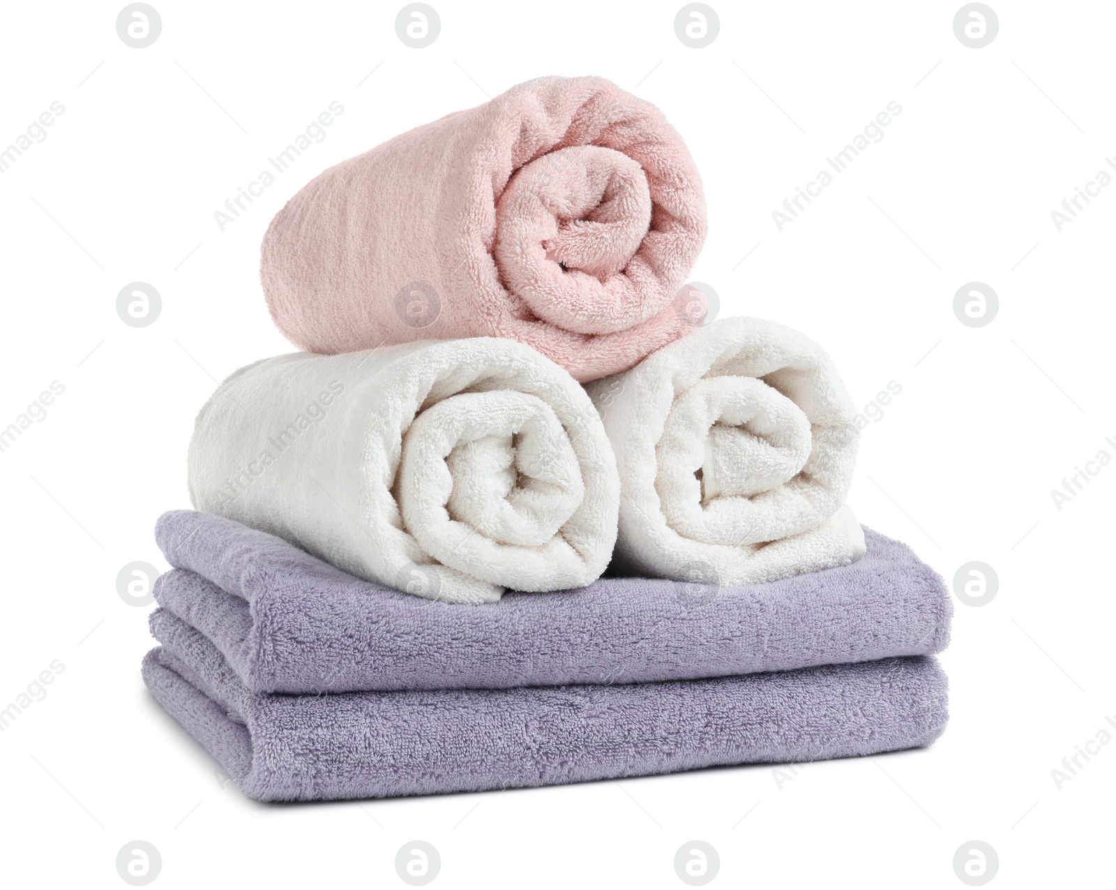 Photo of Clean soft terry towels on white background