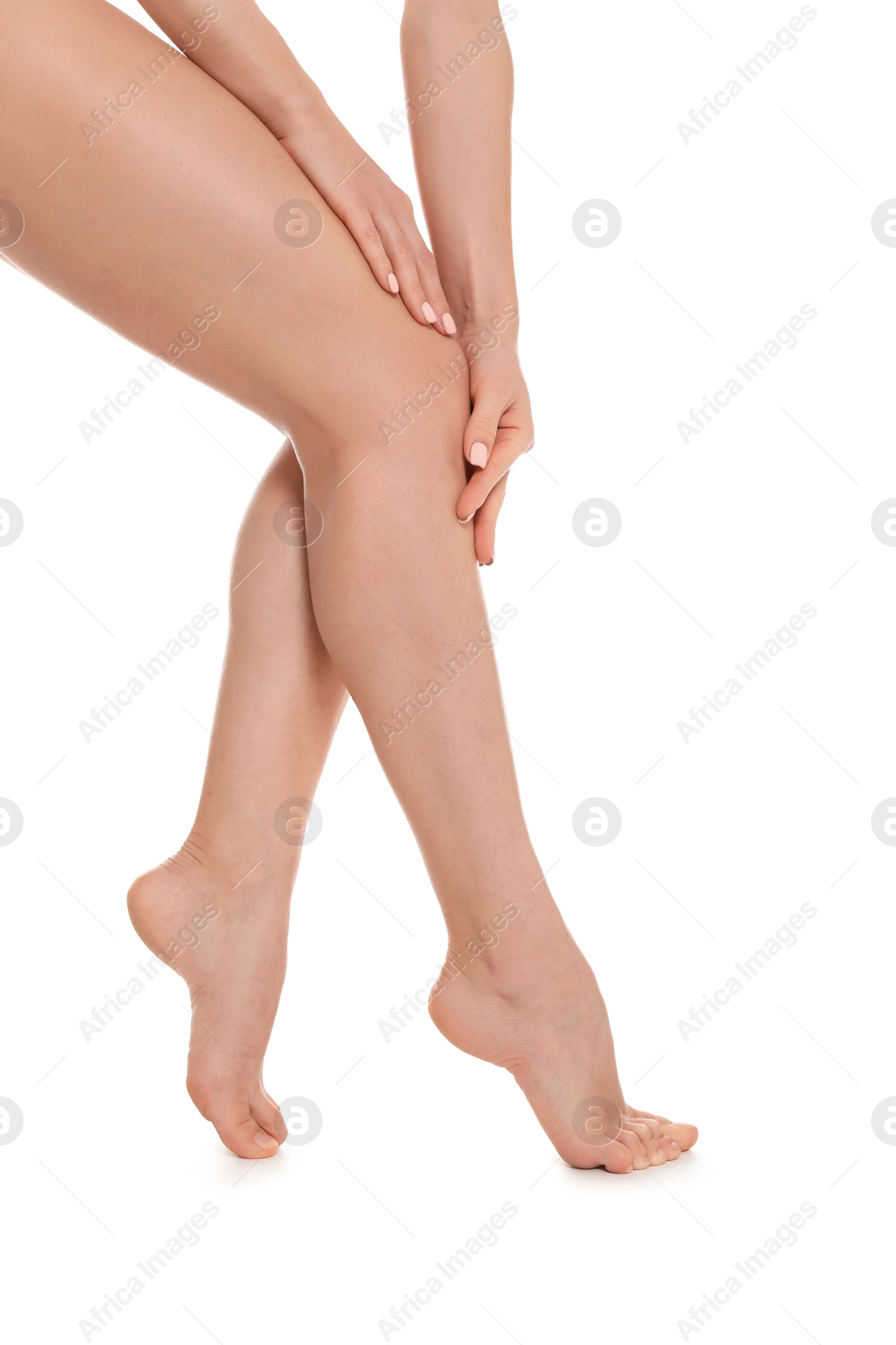 Photo of Young woman showing smooth silky skin after epilation on white background