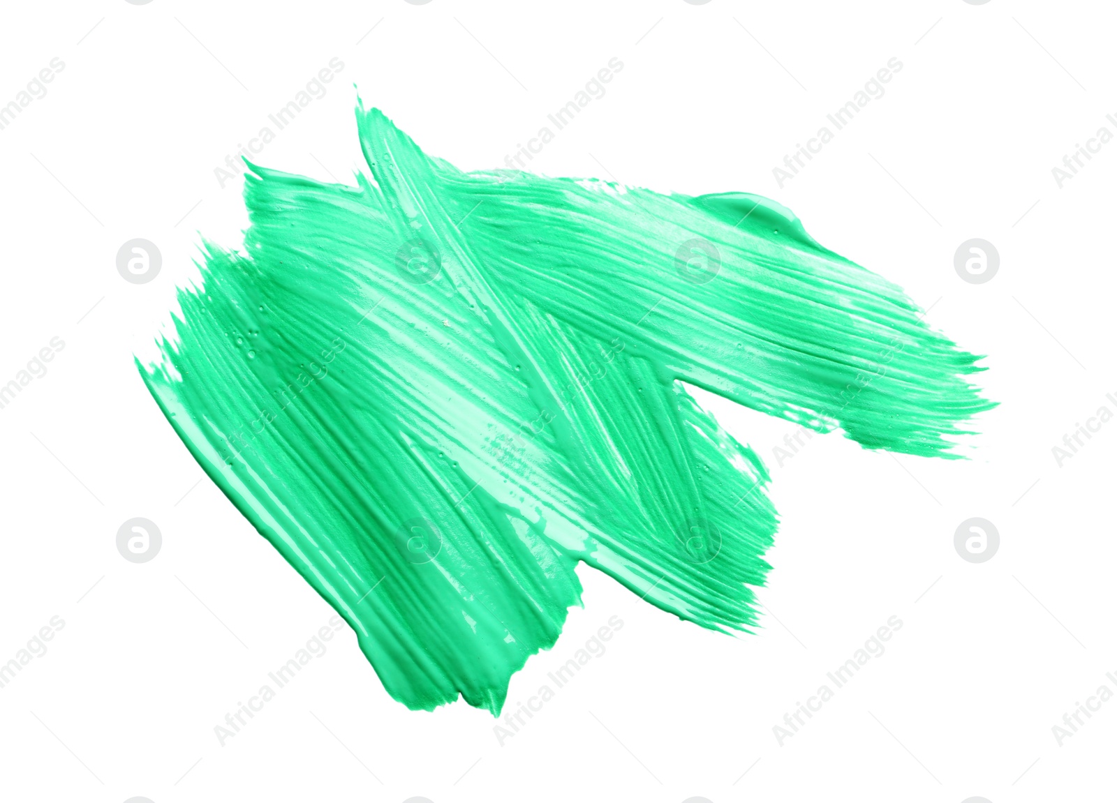 Photo of Abstract brushstroke of green paint isolated on white