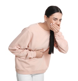 Woman suffering from stomach ache and nausea on white background. Food poisoning