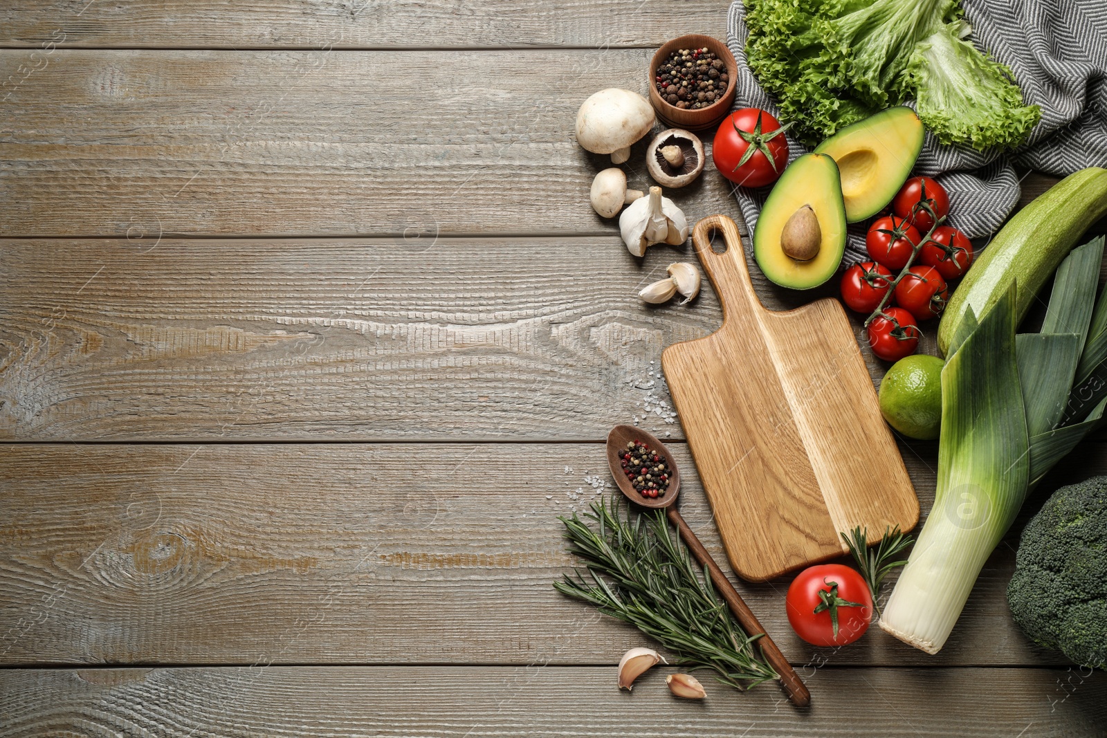 Photo of Flat lay composition with fresh products on wooden table, space for text. Healthy cooking