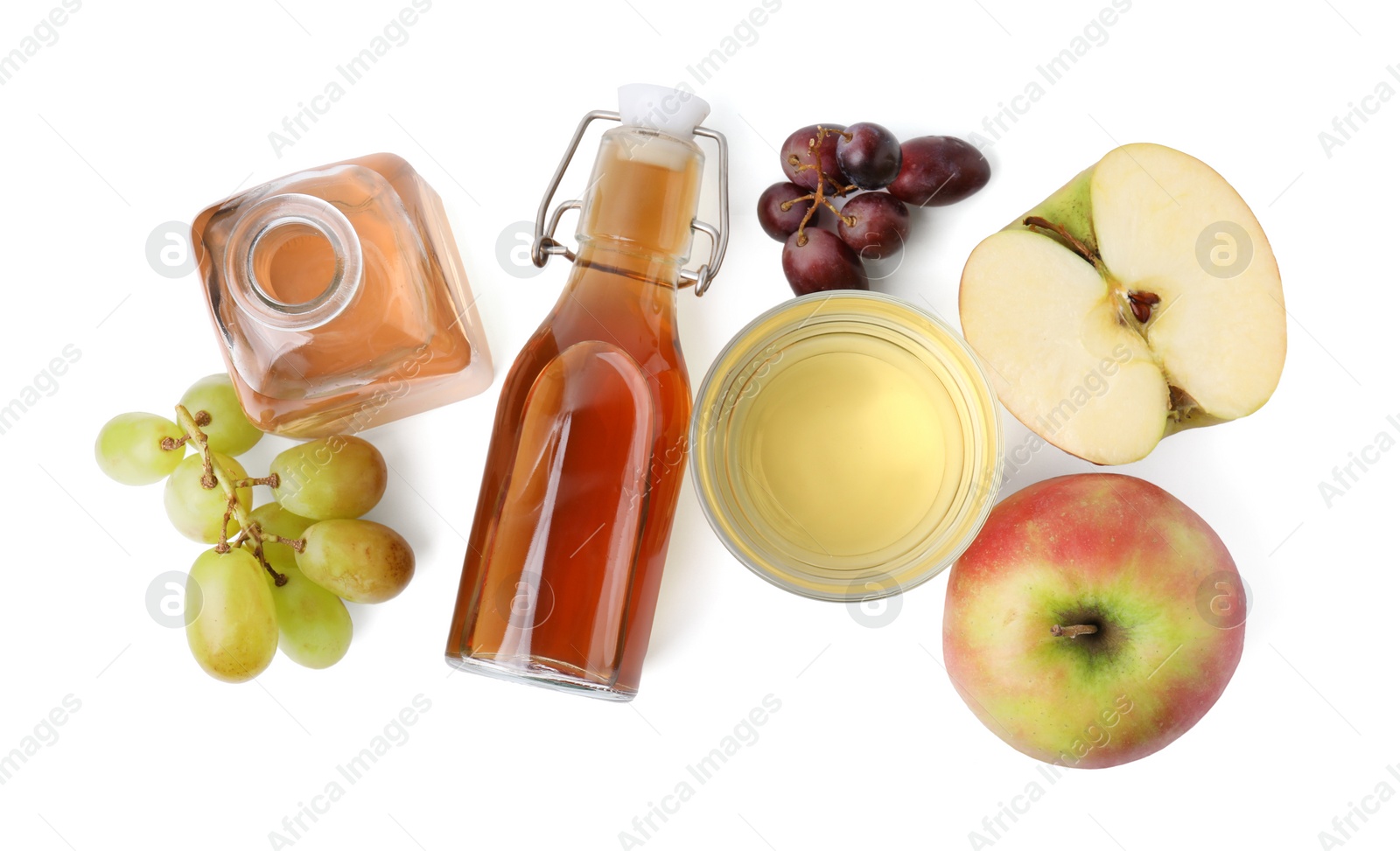 Photo of Different types of vinegar and ingredients isolated on white, top view