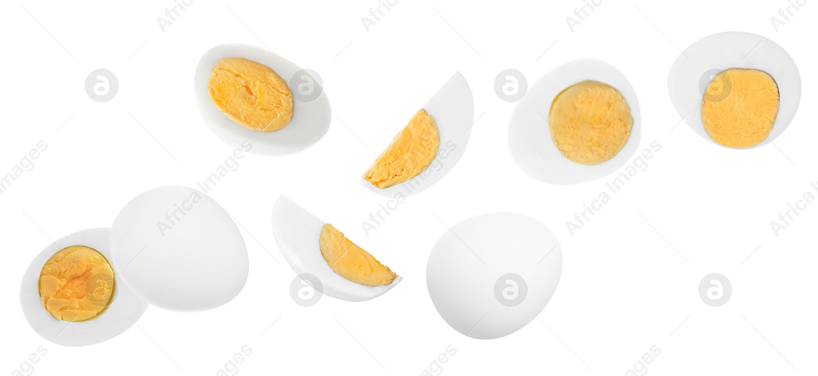 Image of Tasty hard boiled eggs flying on white background. Banner design