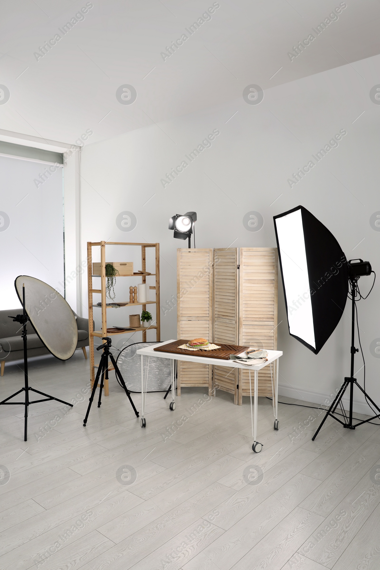 Photo of Tasty sandwich on table in photo studio. Food photography