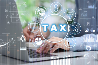 Image of Tax concept. Scheme with icons, charts and man using laptop on background