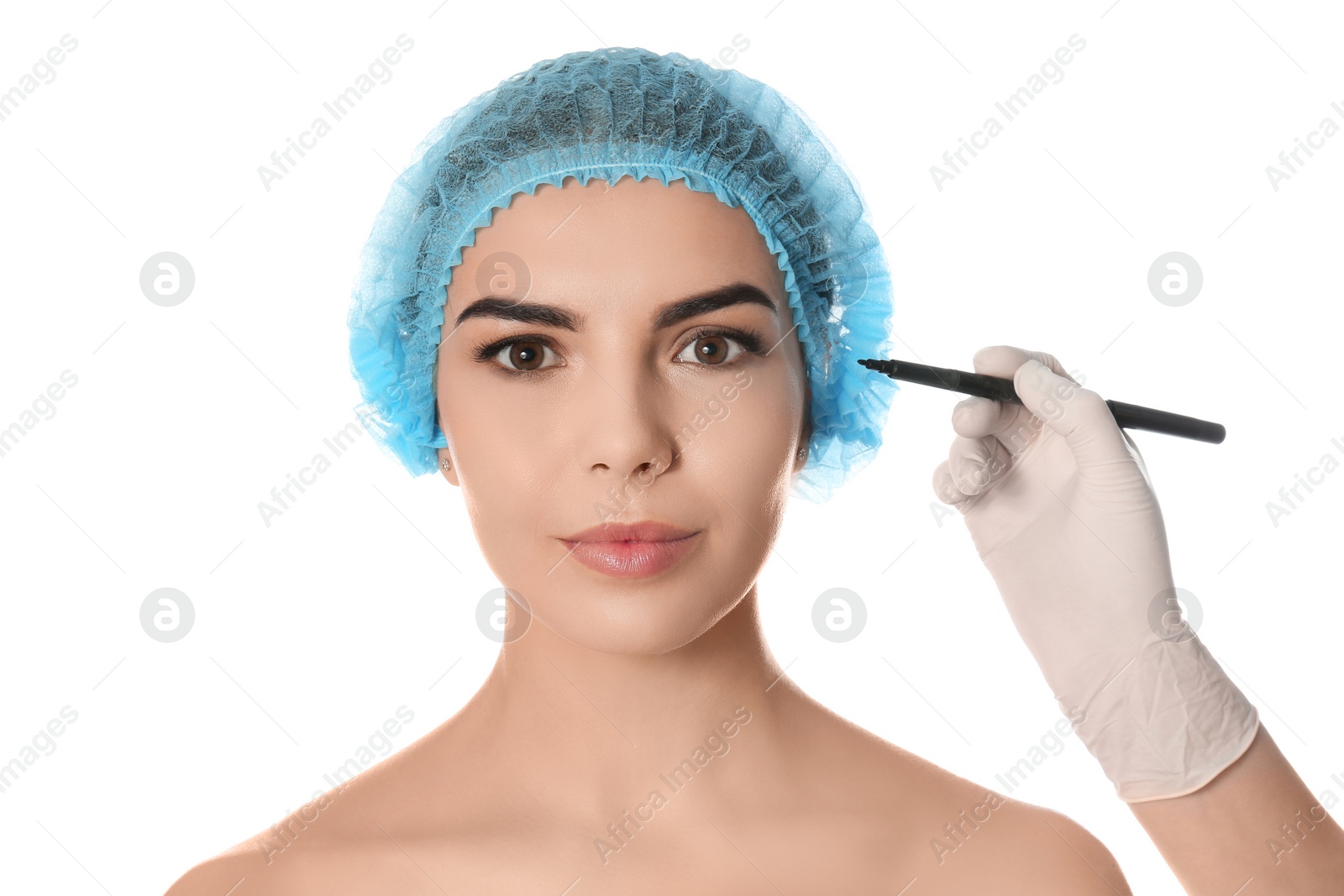 Photo of Doctor holding marker near young woman's face isolated on white. Plastic surgery concept