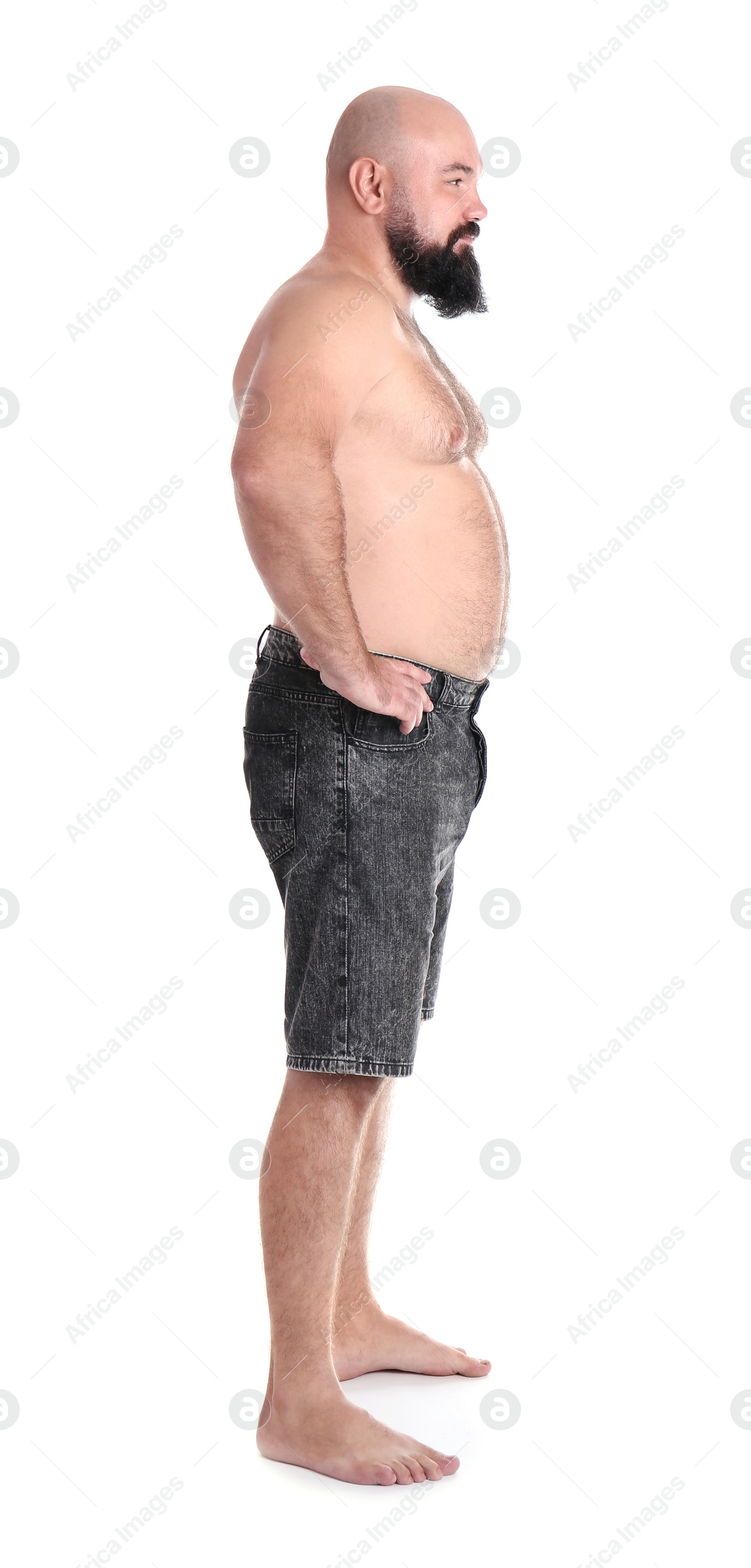 Photo of Full length portrait of fat man on white background. Weight loss