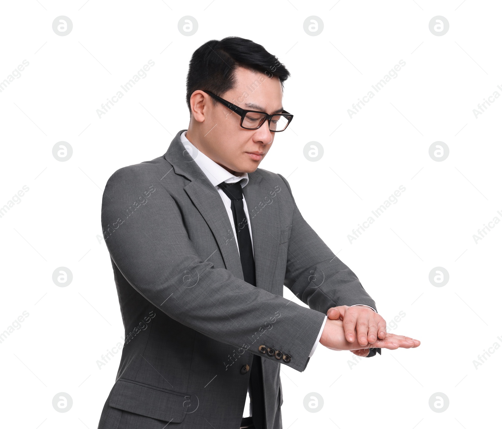 Photo of Businessman in suit posing on white background