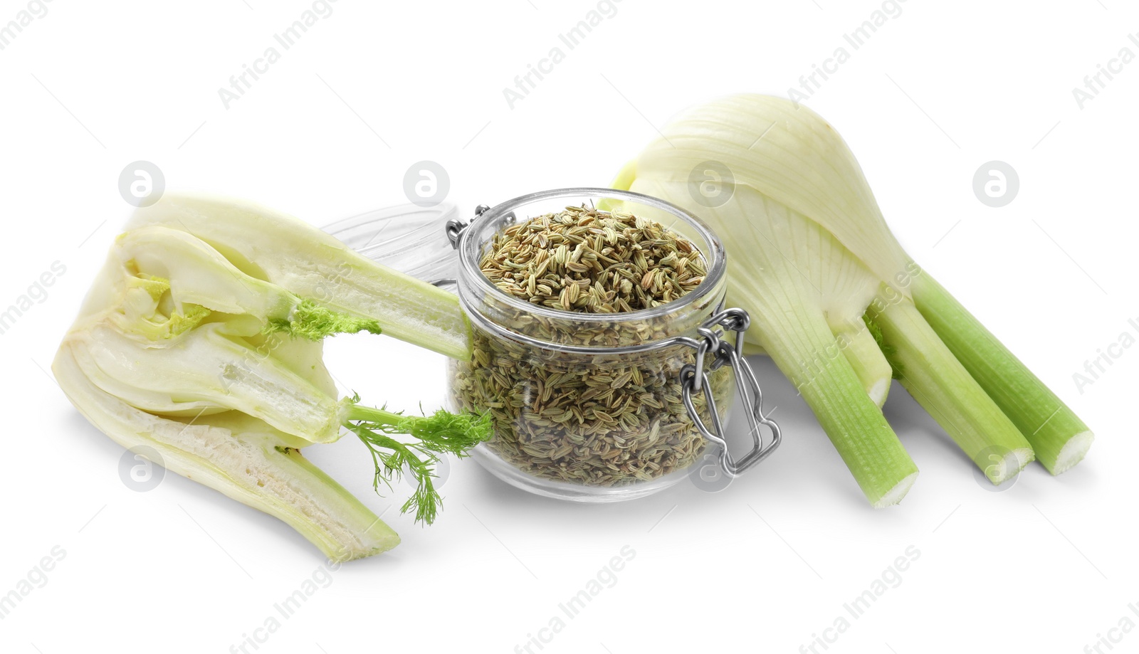 Photo of Fennel seeds in jar and fresh vegetables isolated on white