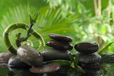 Photo of Composition with stones against blurred background. Zen concept