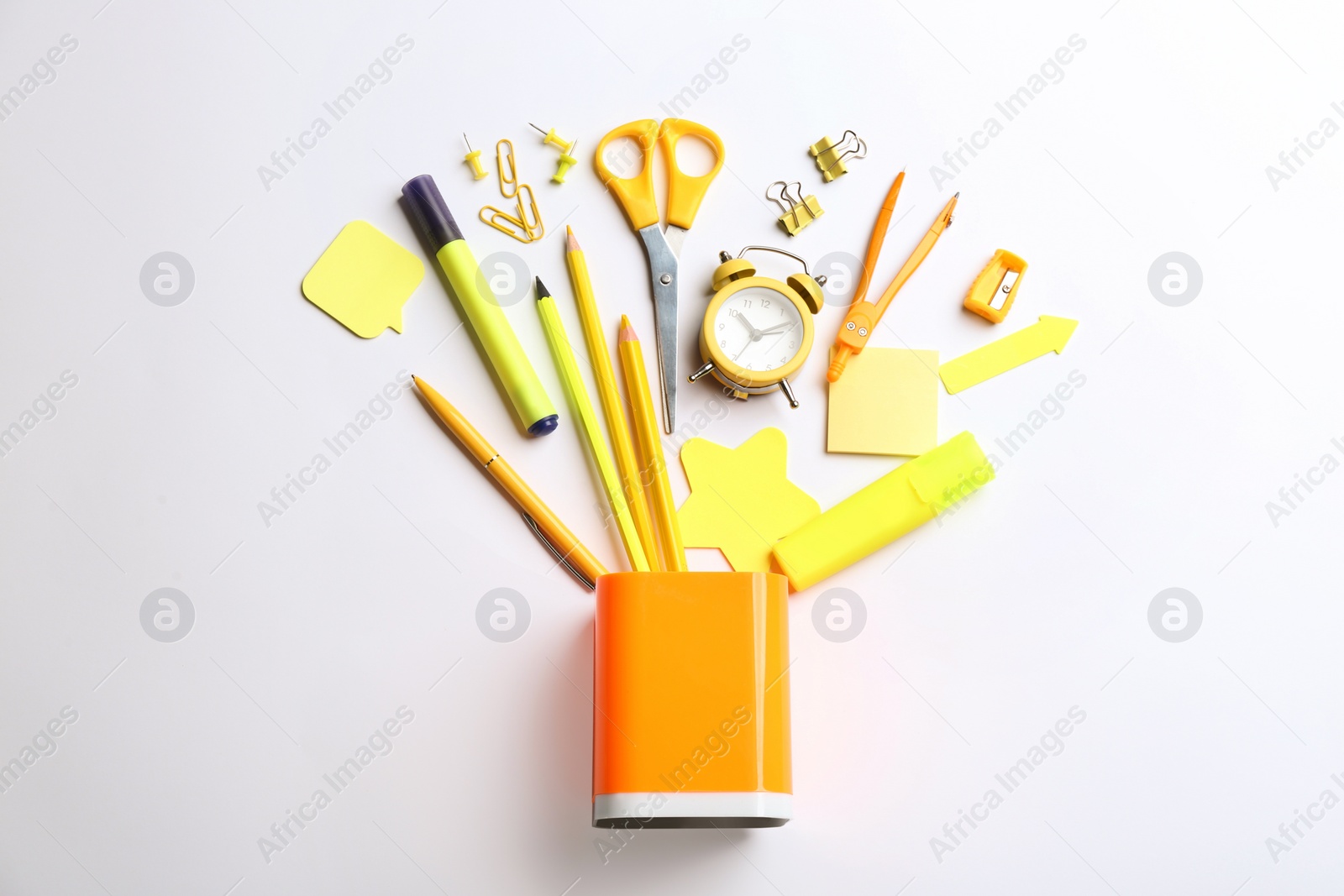 Photo of Flat lay composition with school stationery on white background. Back to school