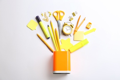 Photo of Flat lay composition with school stationery on white background. Back to school