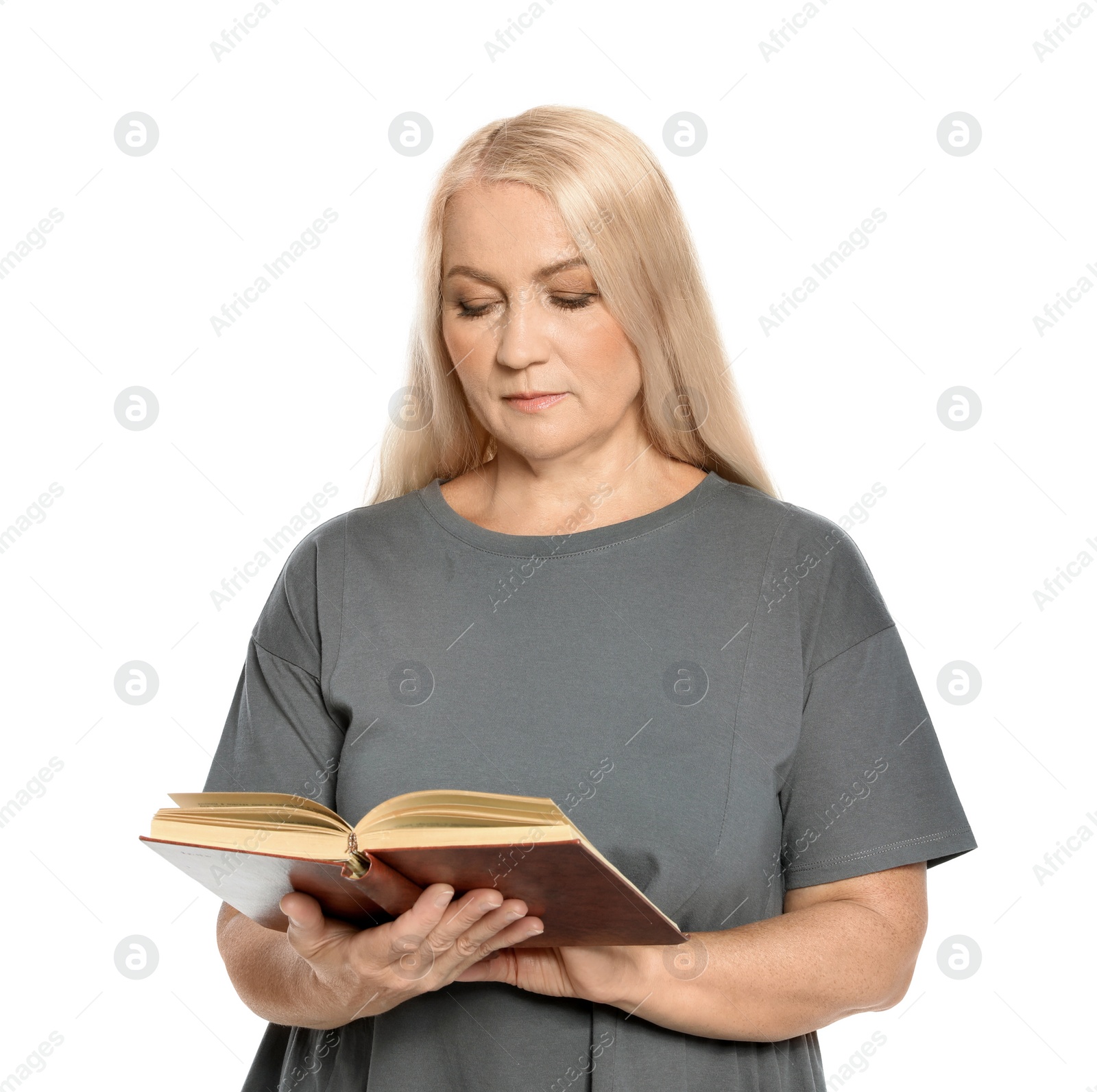 Photo of Mature woman reading book on white background