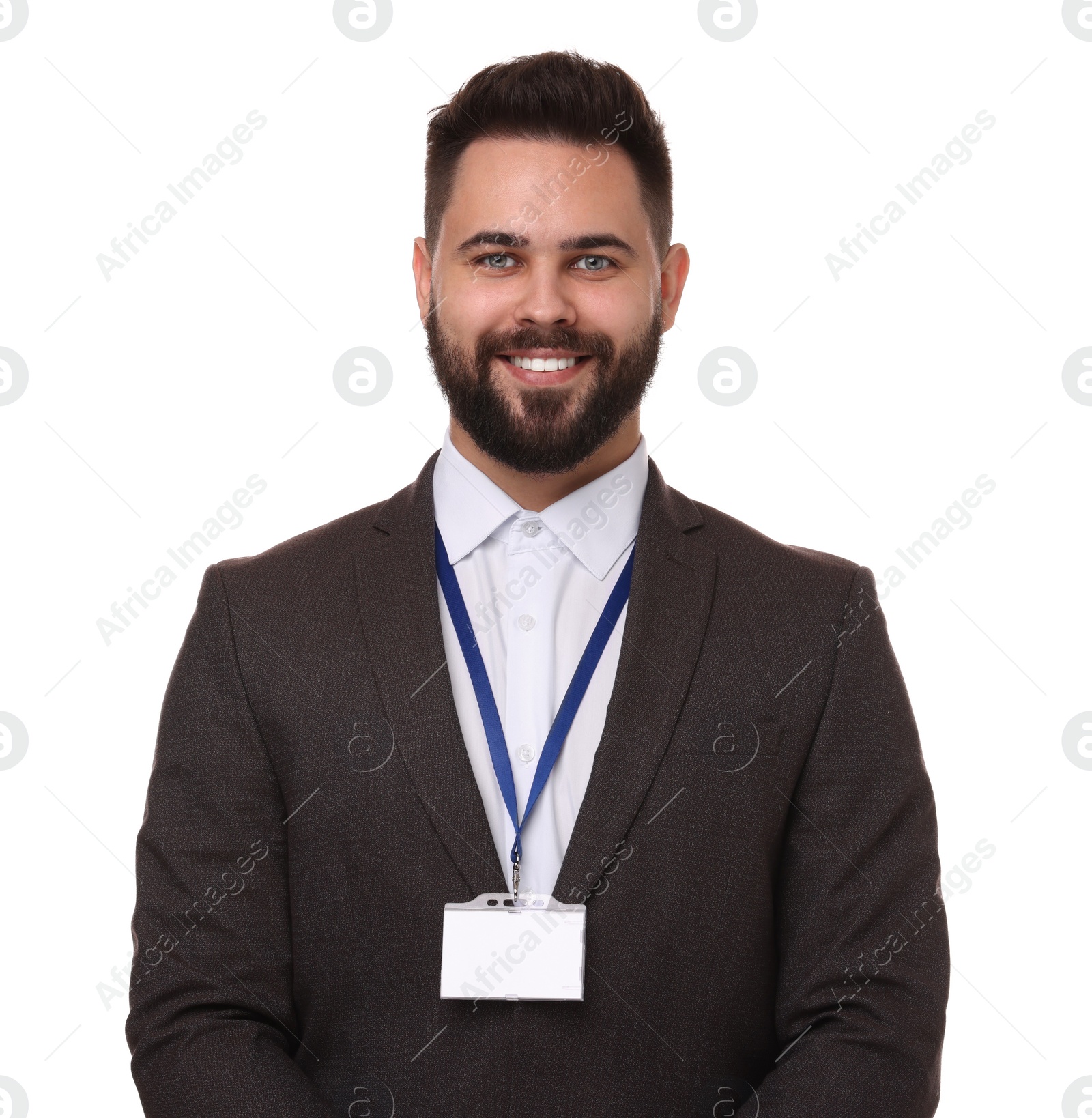 Photo of Happy young man with blank badge isolated on white