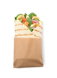 Delicious shawarma with chicken meat and fresh vegetables isolated on white, top view