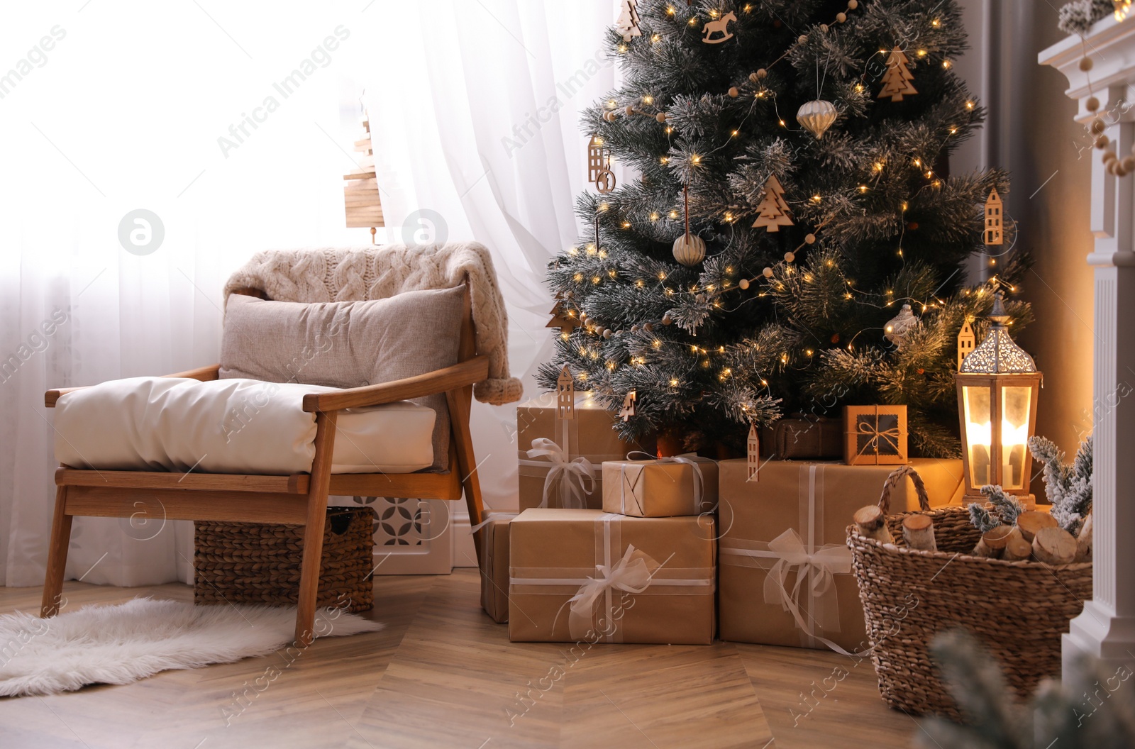 Photo of Beautiful living room interior with decorated Christmas tree and gifts