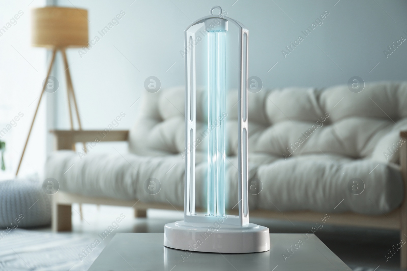 Photo of UV sterilizer lamp on table at home