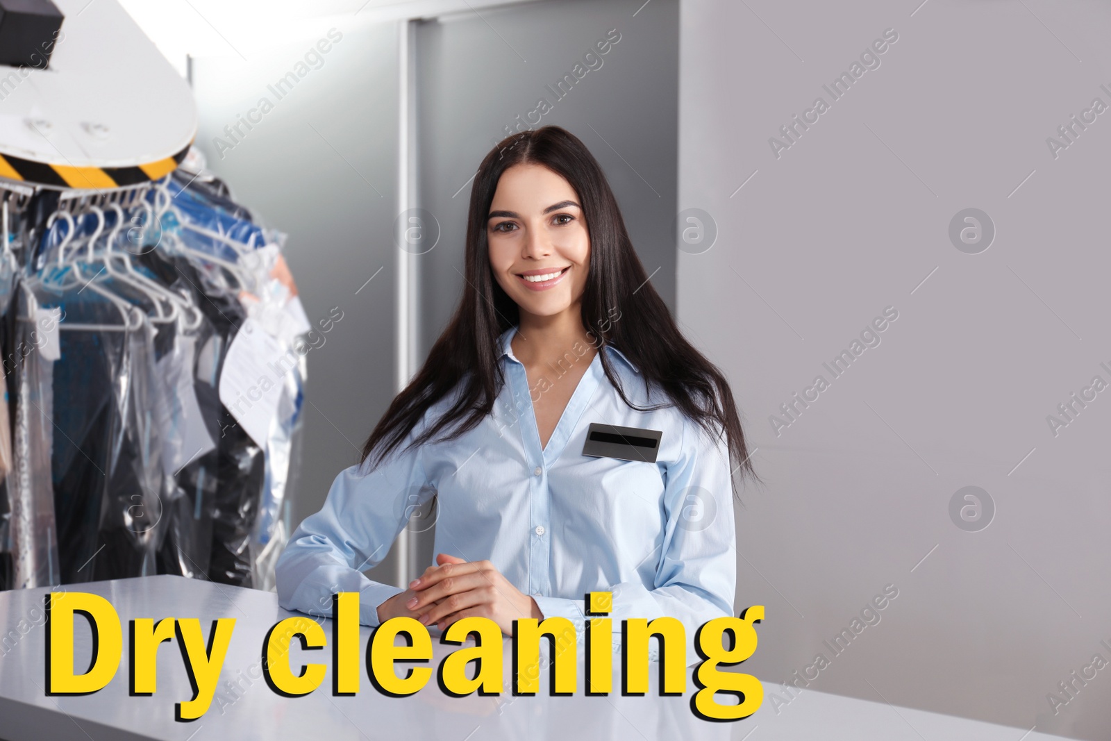 Image of Female worker near counter at modern dry-cleaner's