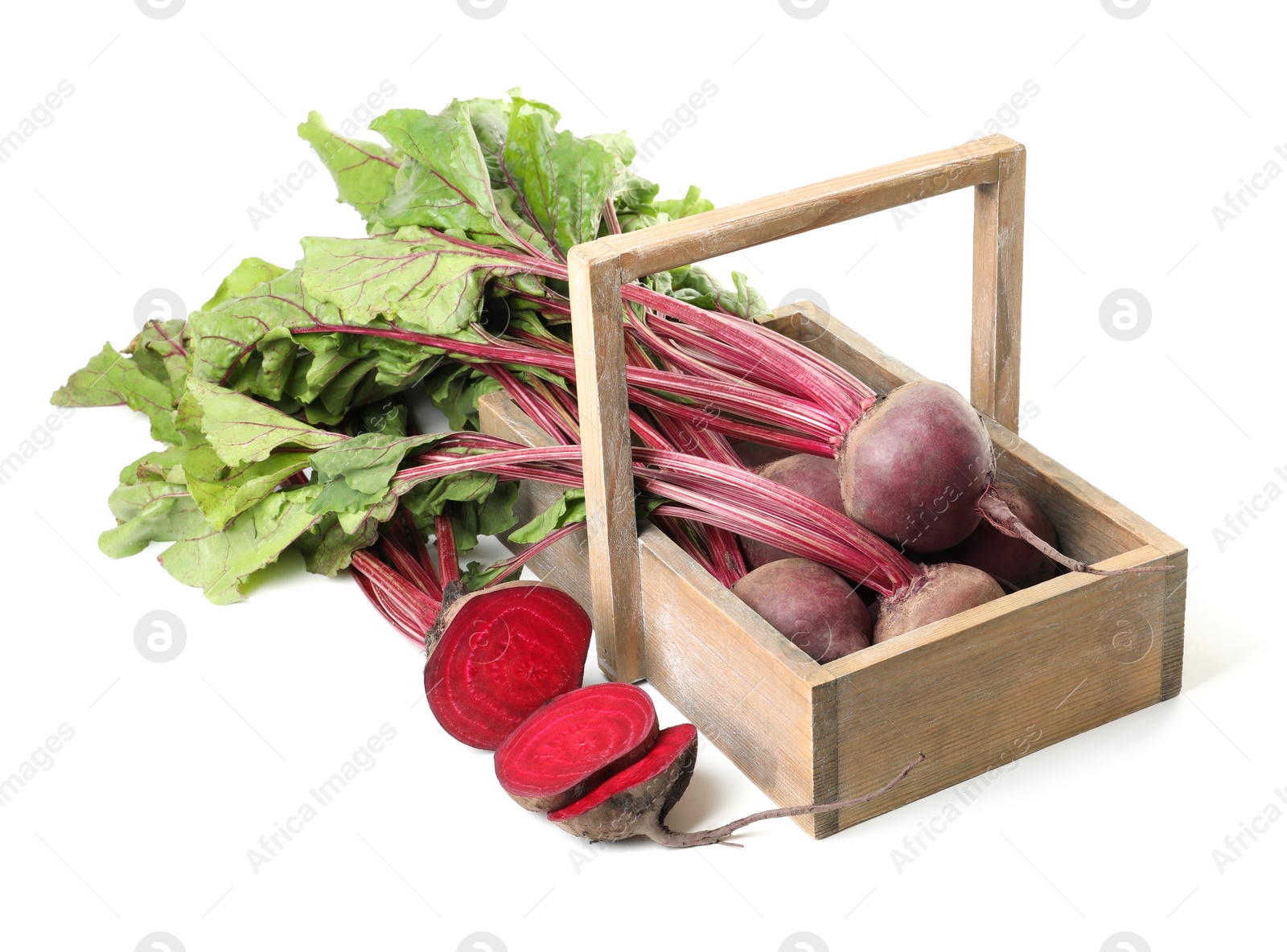 Photo of Raw ripe beets and wooden basket on white background