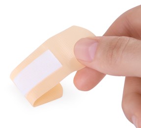 Photo of Woman with medical adhesive bandage isolated on white, closeup