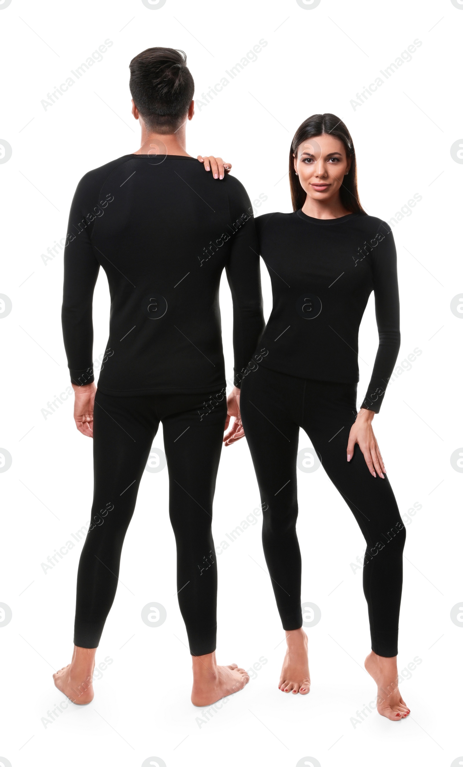 Photo of Couple wearing thermal underwear isolated on white