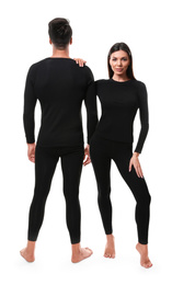 Photo of Couple wearing thermal underwear isolated on white