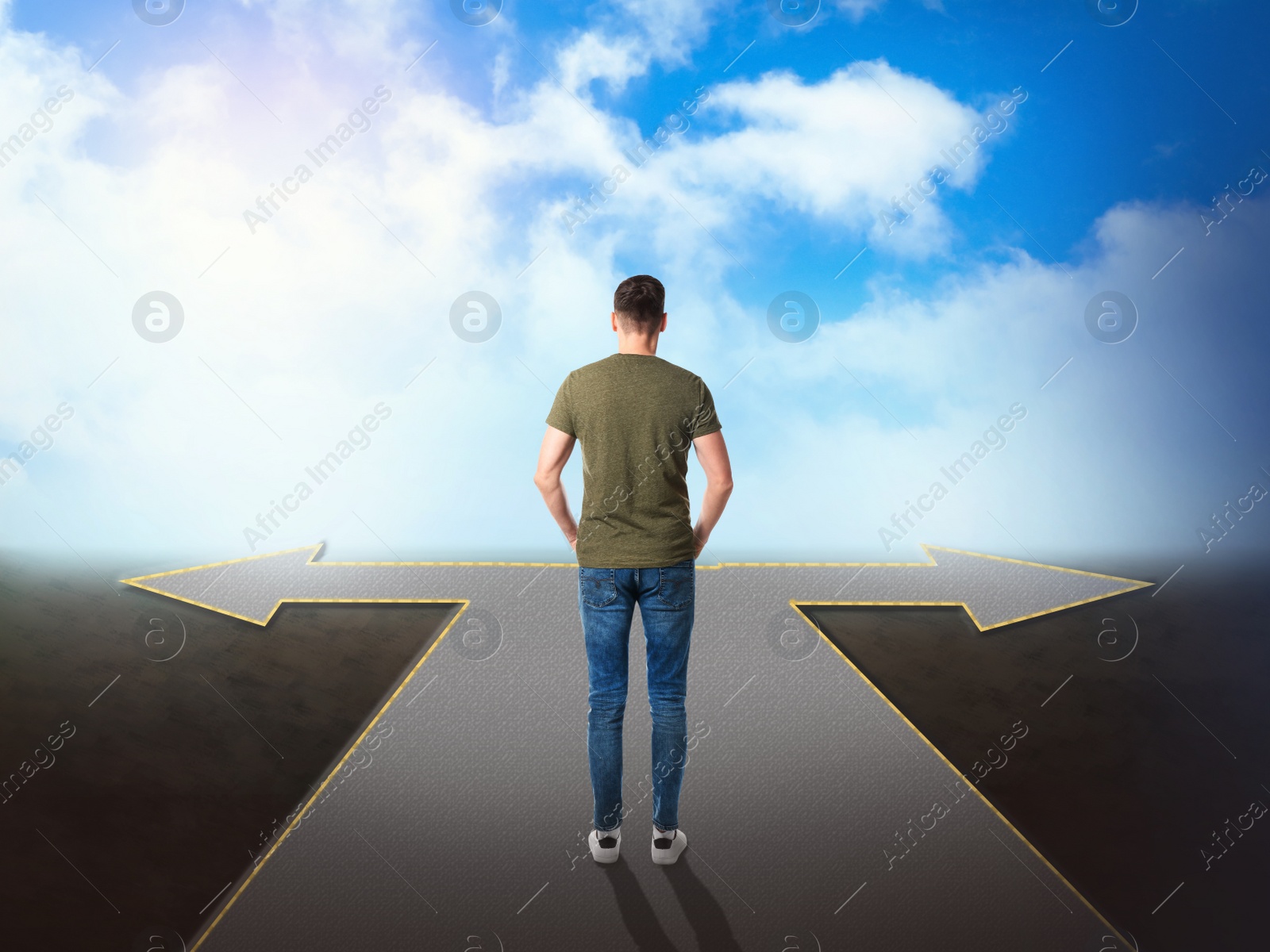 Image of Choose your way. Man standing at crossroads taking important decision