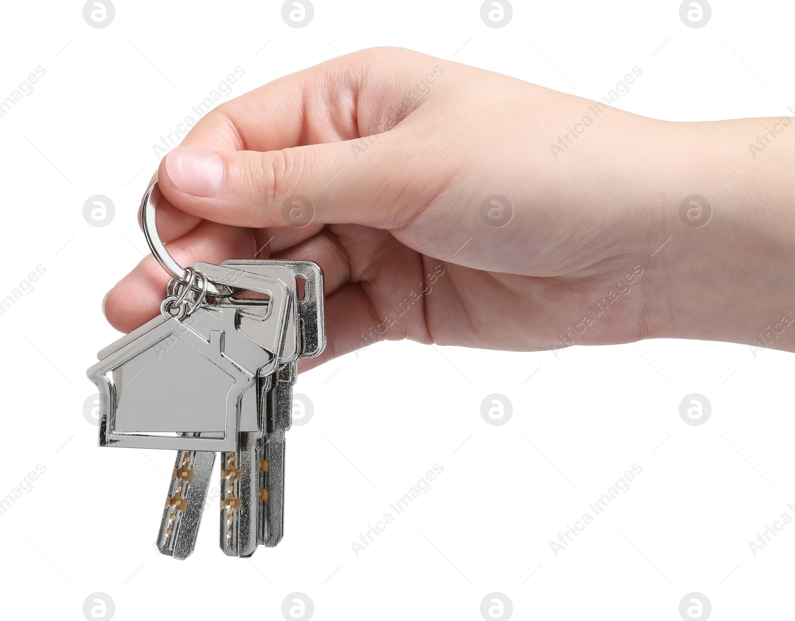 Photo of Woman holding keys with keychain in shape of house isolated on white, closeup
