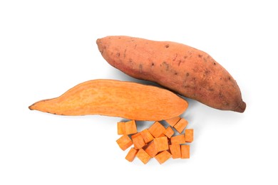 Photo of Cut and whole sweet potatoes on white background, top view