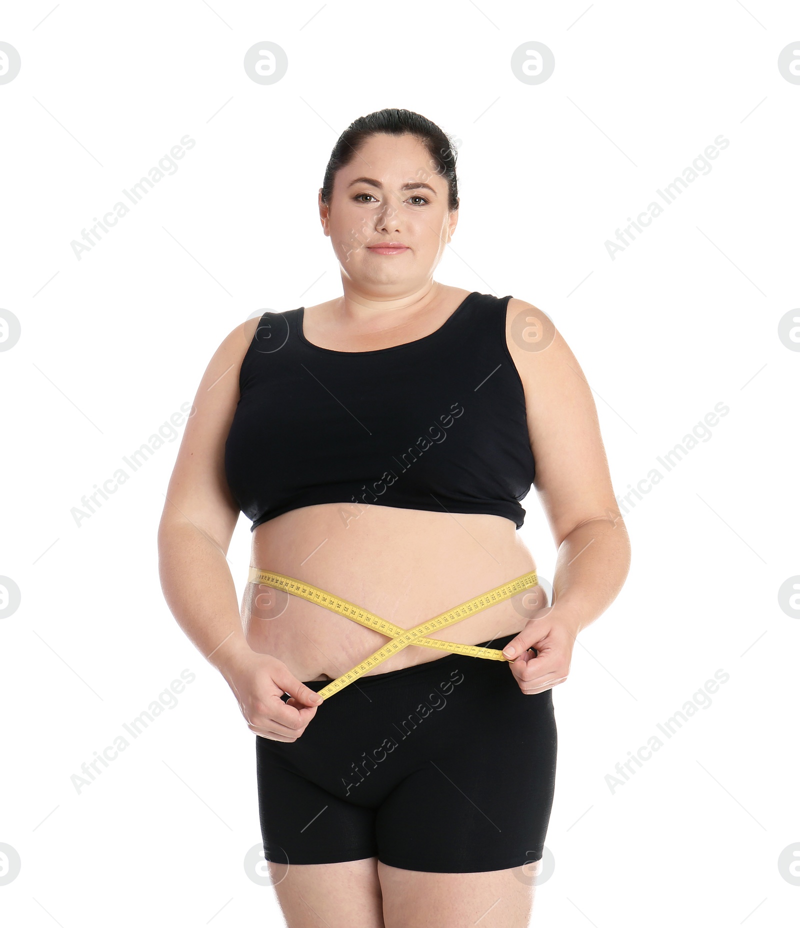 Photo of Fat woman with measuring tape on white background. Weight loss