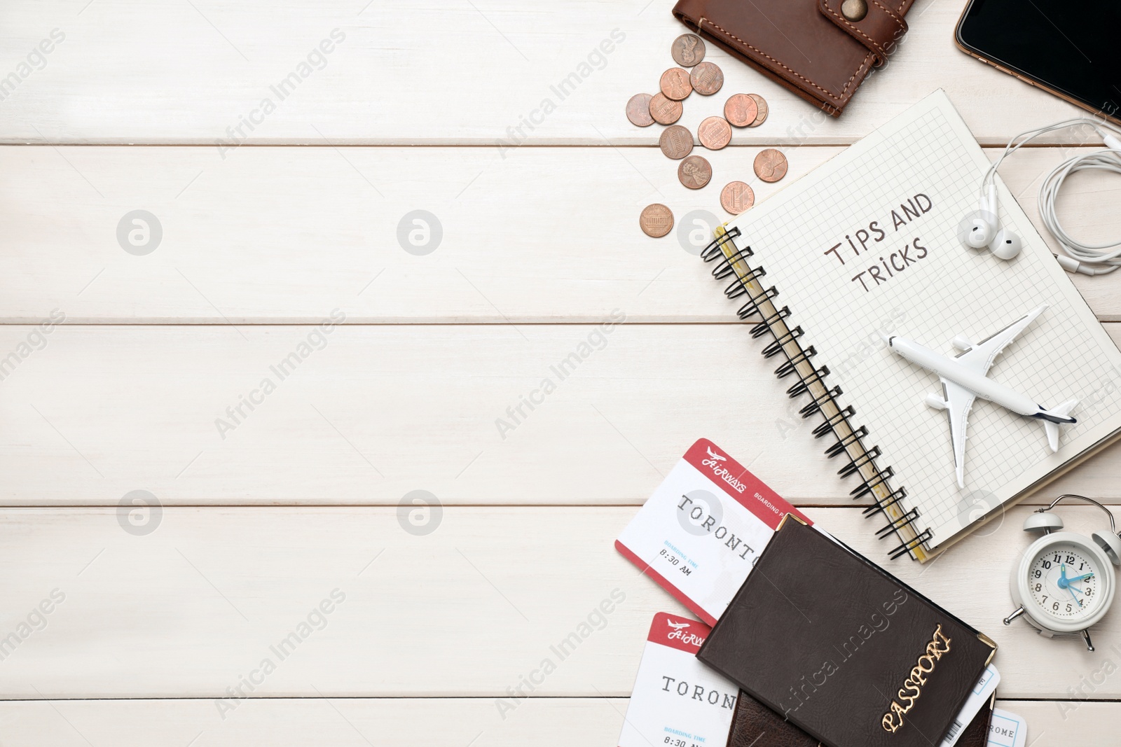 Photo of Flat lay composition with notebook on white wooden table, space for text. Tips and Tricks