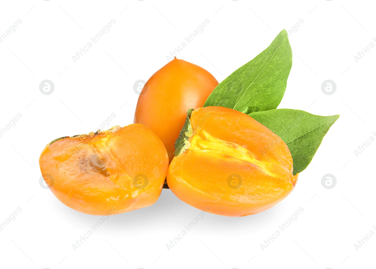 Photo of Delicious cut and whole persimmons isolated on white