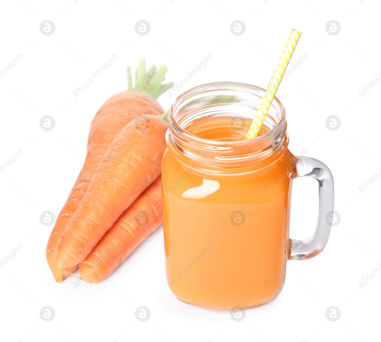 Photo of Freshly made carrot juice in mason jar on white background