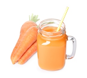 Photo of Freshly made carrot juice in mason jar on white background