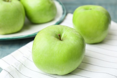 Photo of Fresh green apples on table, closeup