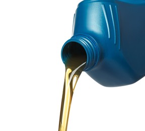 Pouring motor oil from blue container on white background, closeup