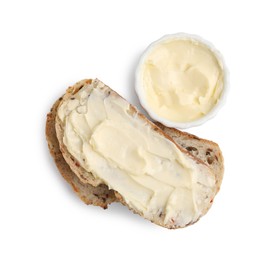 Photo of Slices of bread with tasty butter on white background, top view