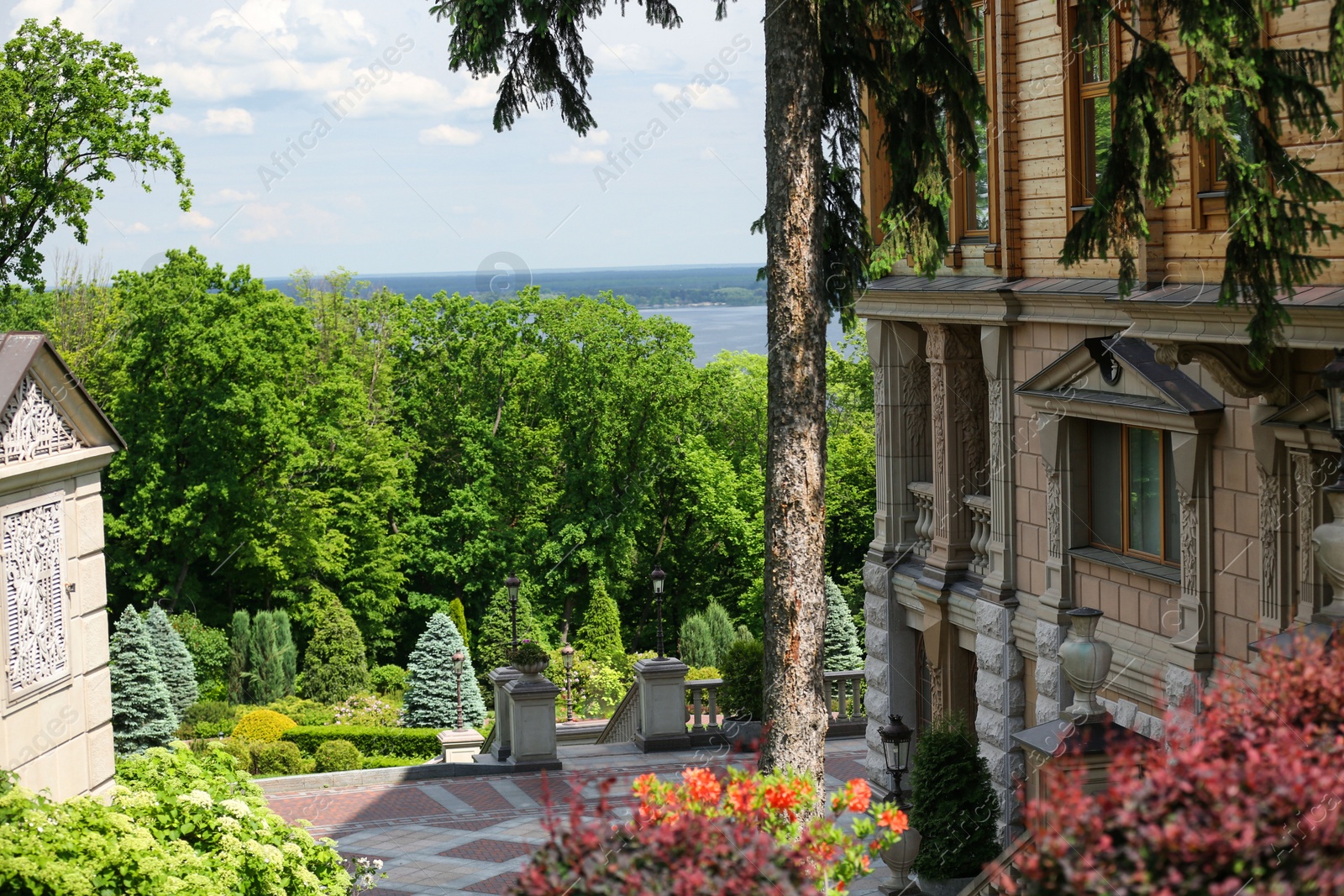 Photo of NOVI PETRIVTSI, UKRAINE - MAY 22, 2019: View of Honka club house in Mezhyhirya national park (estate of former president Viktor Yanukovych)