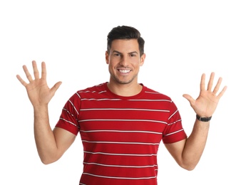 Photo of Man showing number ten with his hands on white background