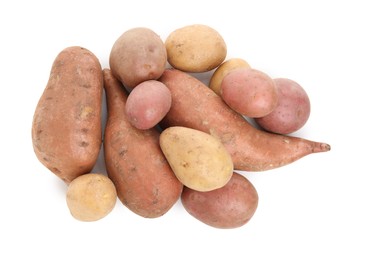 Photo of Different types of fresh potatoes on white background, top view