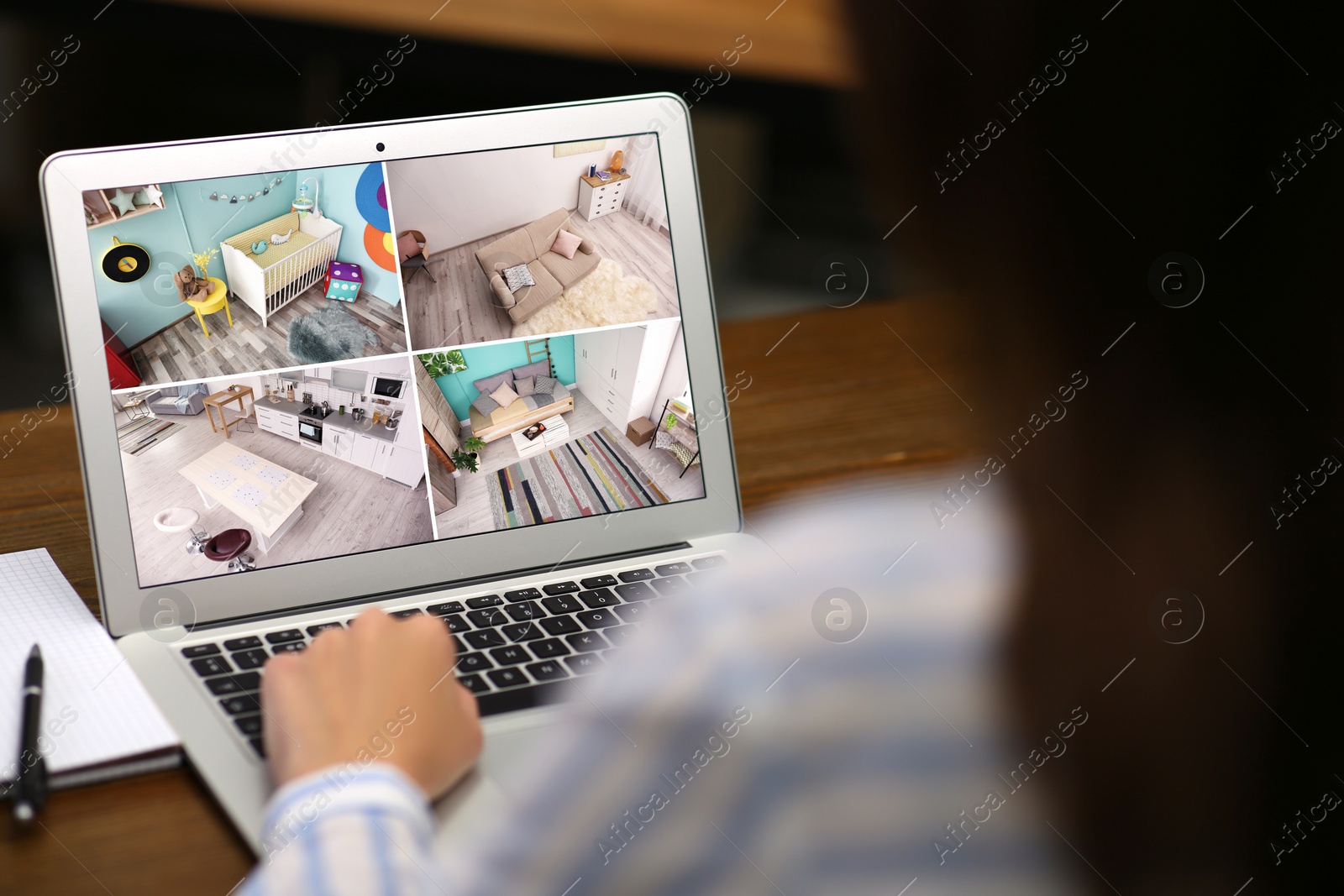 Image of Woman monitoring modern cctv cameras on laptop indoors, closeup. Home security system