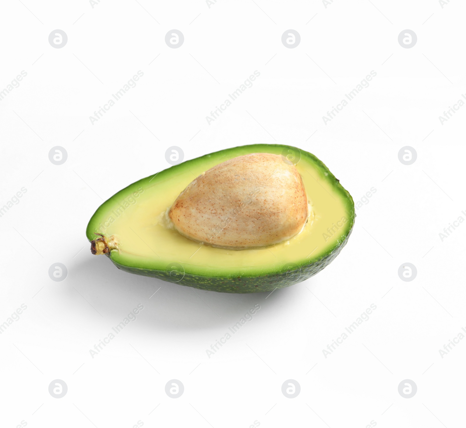 Photo of Half of avocado on white background. Natural food high in protein