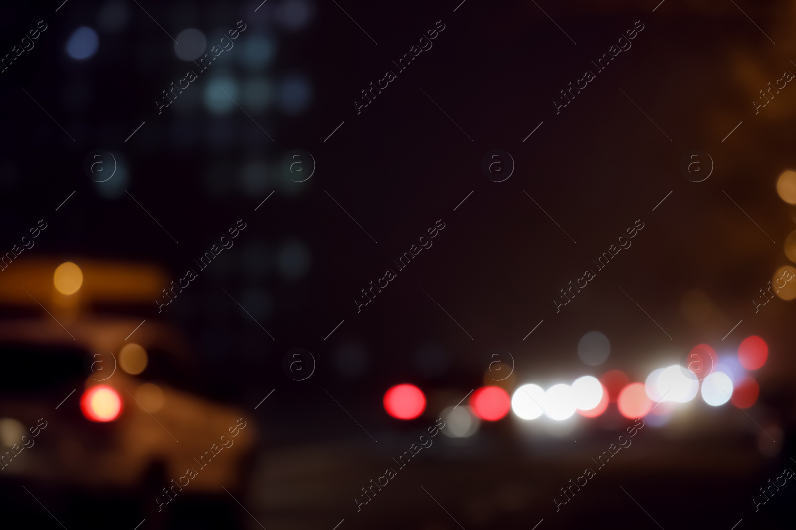 Photo of Blurred view of night city. Bokeh effect