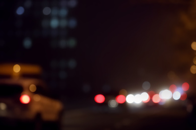 Blurred view of night city. Bokeh effect