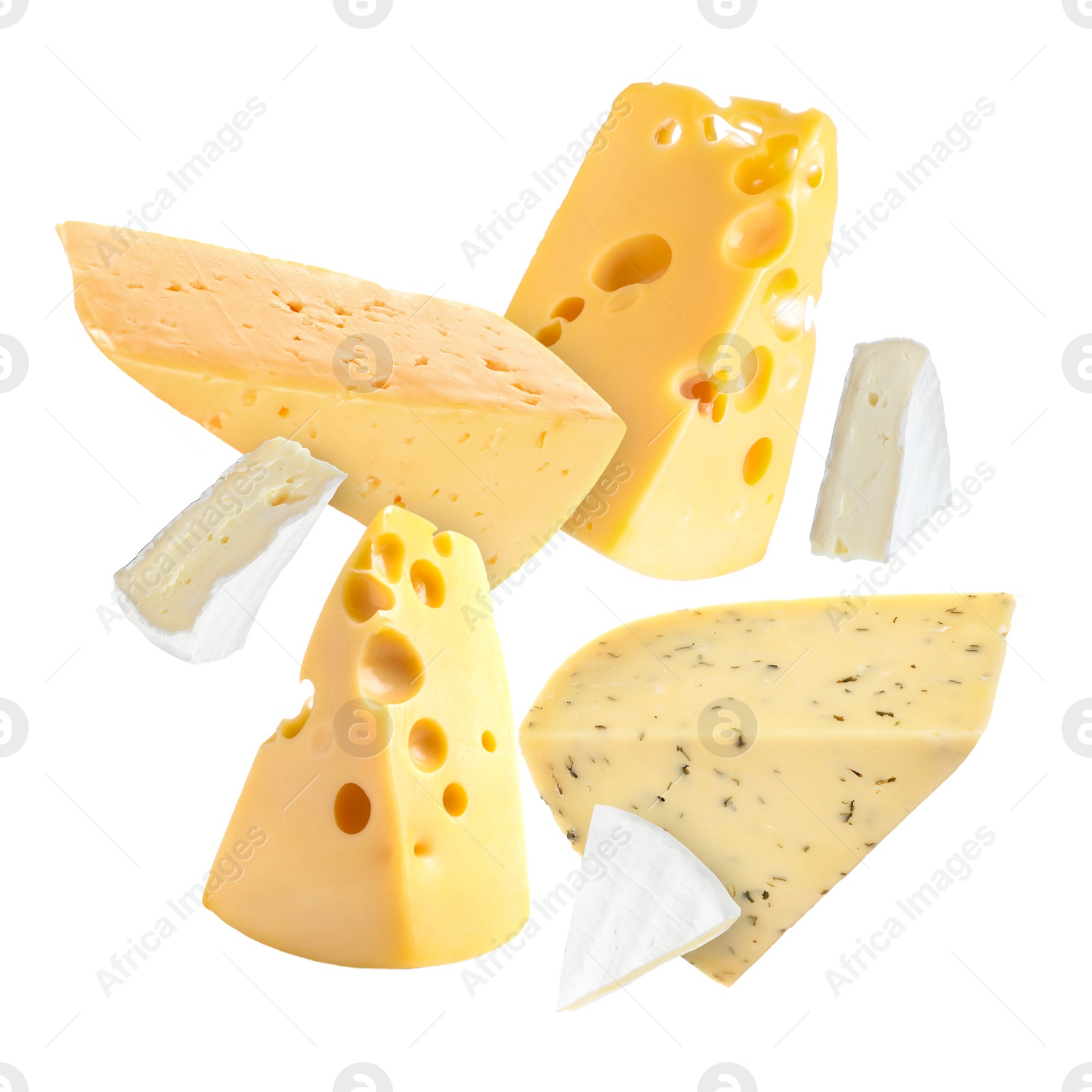 Image of Different kinds of cheese falling on white background