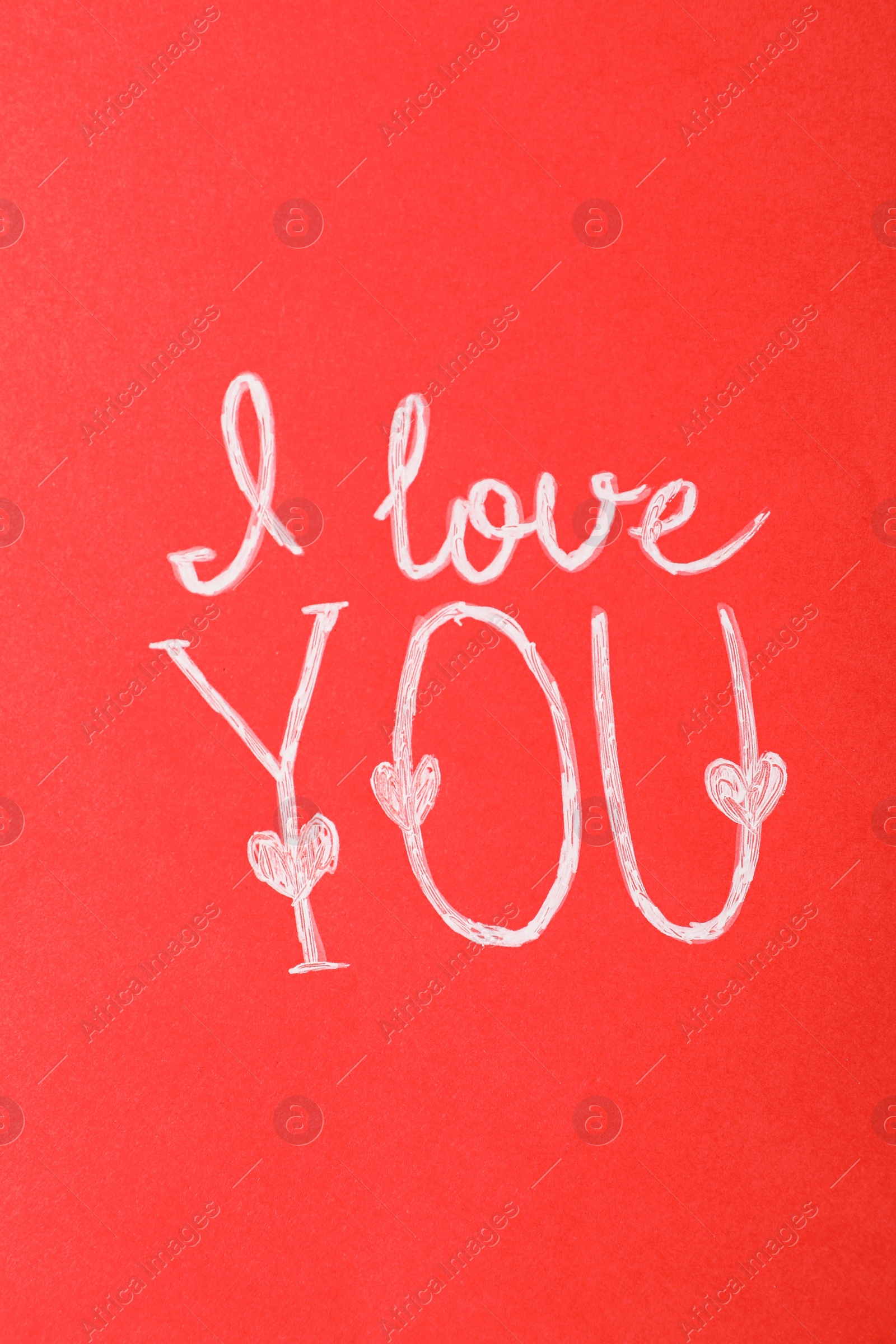 Photo of Text I Love You on red background