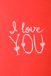 Photo of Text I Love You on red background