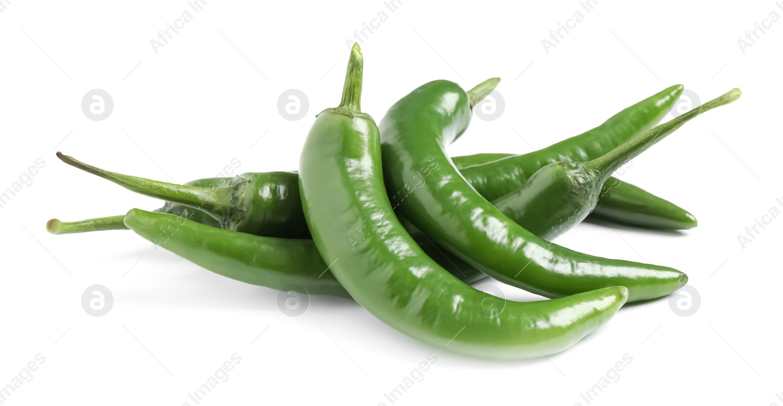 Photo of Green hot chili peppers on white background