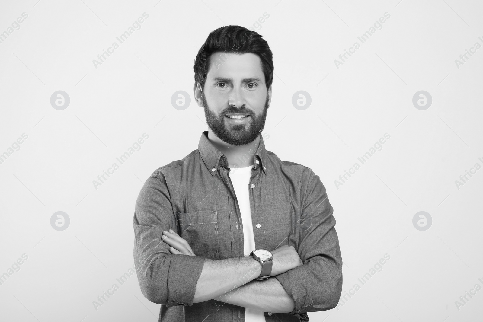 Image of Portrait of handsome man on light background. Black and white effect