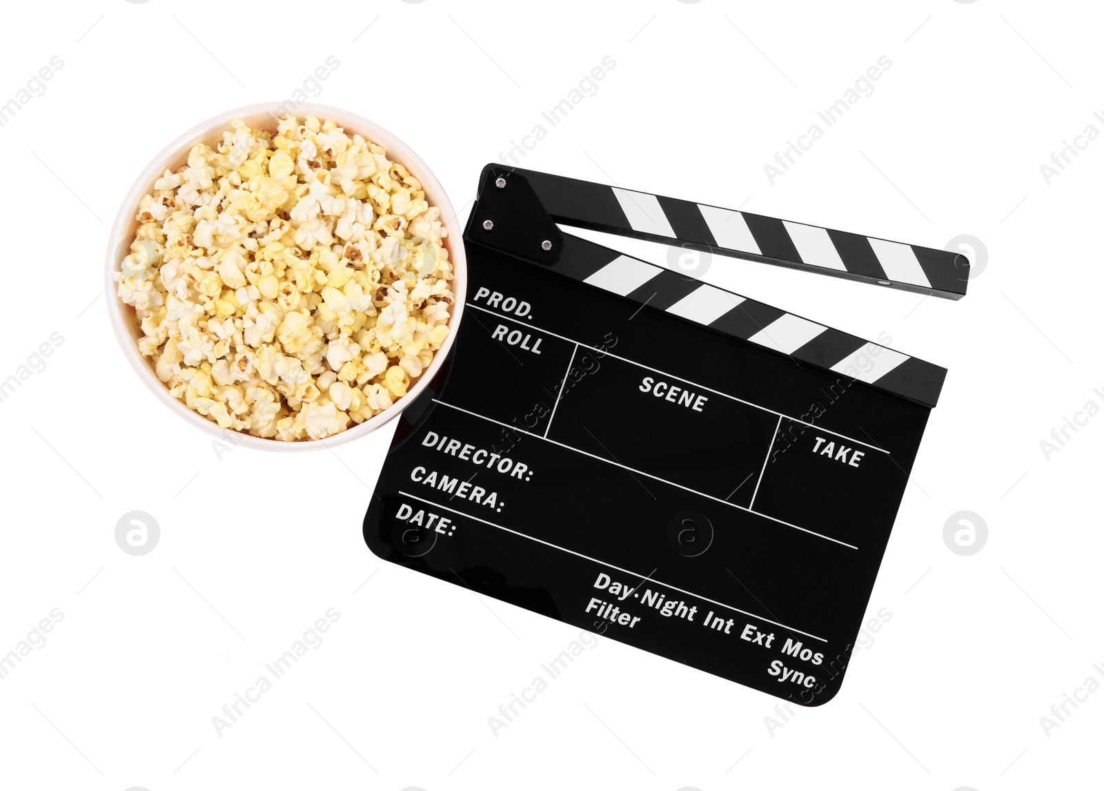Photo of Movie clapper and bucket of tasty popcorn isolated on white, top view